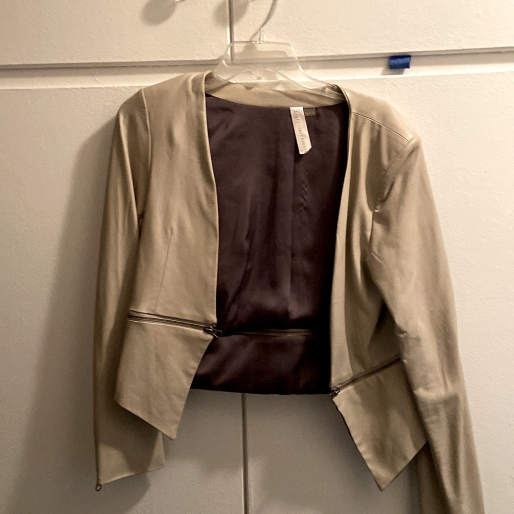 Polyester cream jacket with padded sleeves size medium